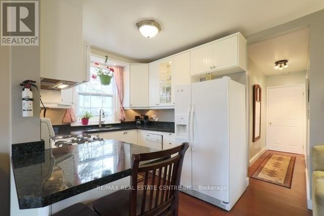 1 Hiawatha (Main) Road, Toronto (Greenwood-Coxwell), Ontario  M4L 2X7 - Photo 2 - E12990170