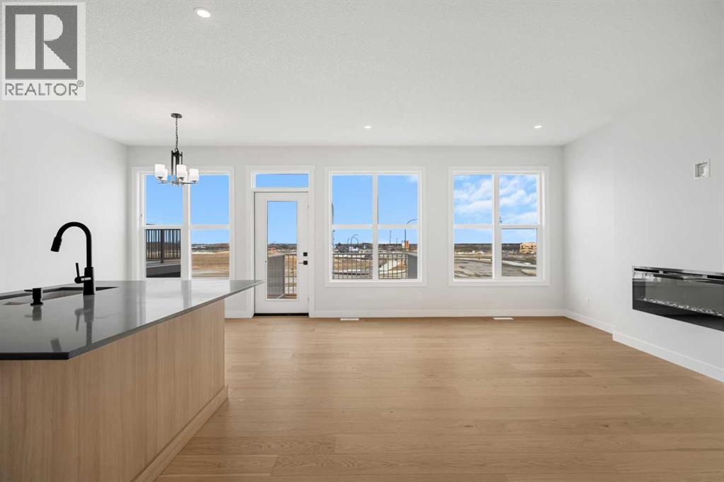 192 Belmont Passage Sw, Calgary, Alberta  T2X 5T6 - Photo 3 - A2300429