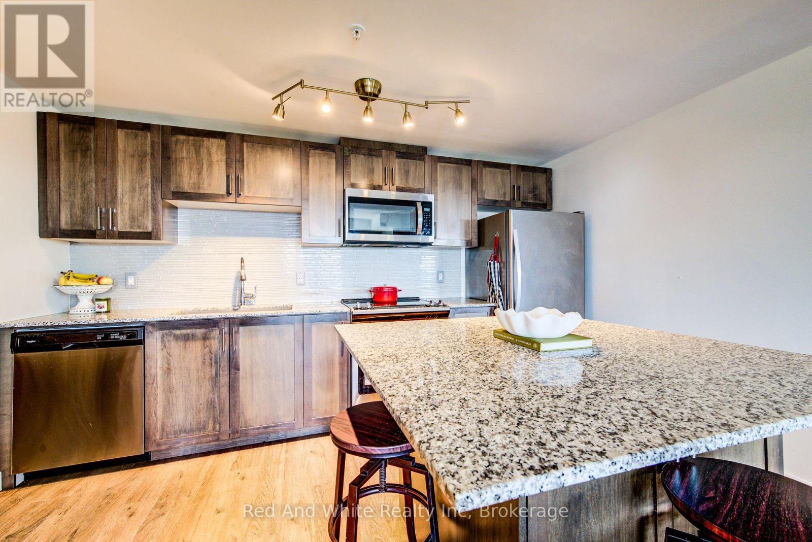 407 - 175 Commonwealth Street, Kitchener, Ontario N2E 0H4 - Photo 7 - X12991418