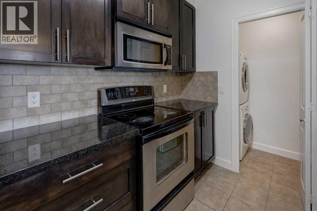 103, 88 Arbour Lake Road NW, Calgary, Alberta  T3G 0C2 - Photo 9 - A2300747