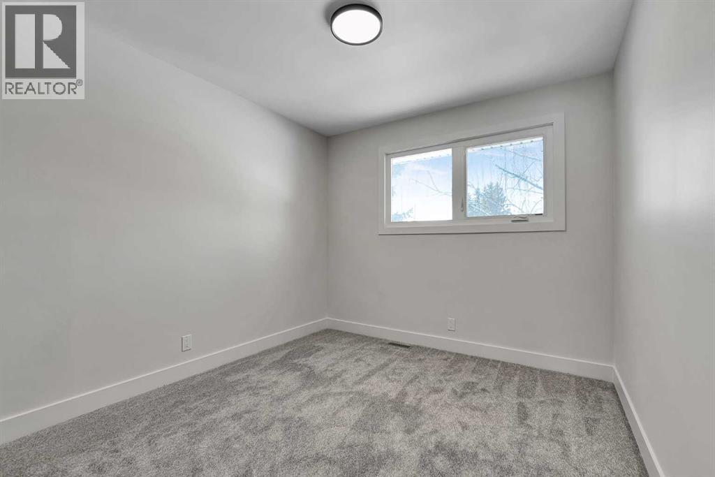 928 Lake Twintree Crescent Se, Calgary, Alberta  T2J 2W3 - Photo 27 - A2292509