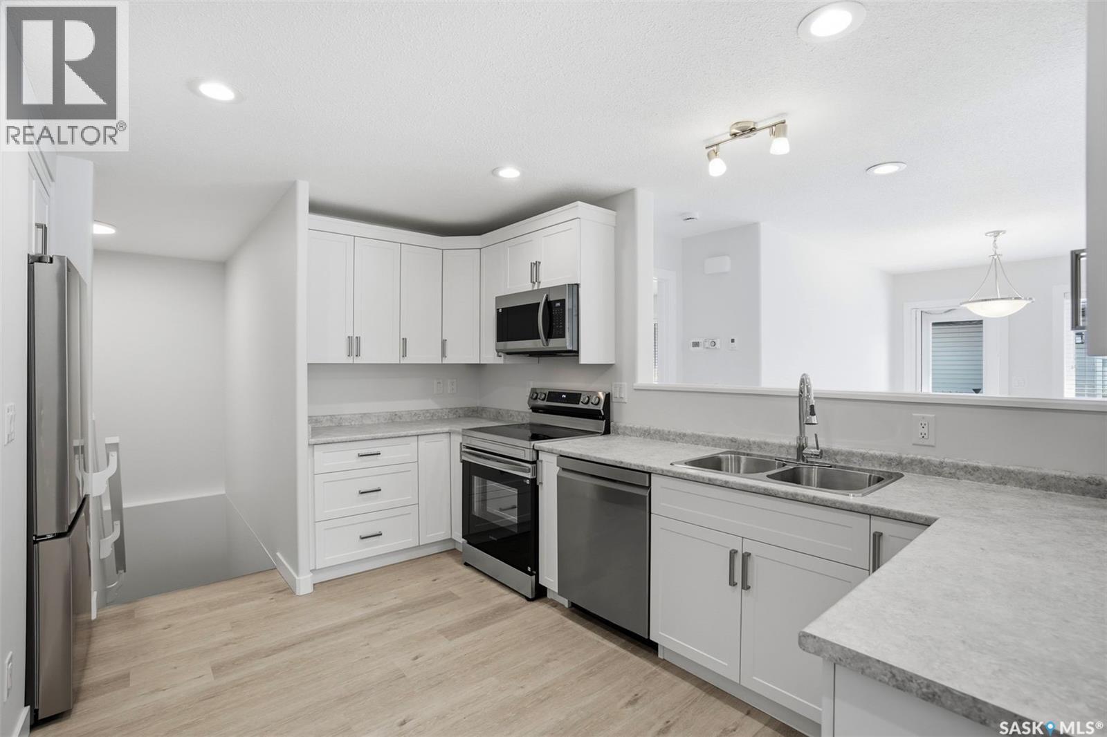 27 547 East Hampton Boulevard, Saskatoon, Saskatchewan  S7R 0H8 - Photo 4 - SK032750