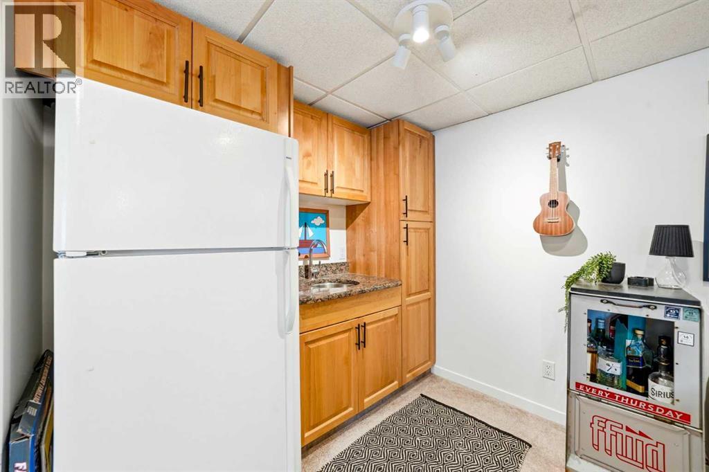 12028 Canfield Road SW, Calgary, Alberta  T2W 1V2 - Photo 23 - A2300272