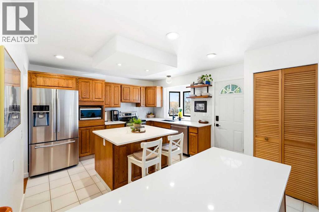 12028 Canfield Road SW, Calgary, Alberta  T2W 1V2 - Photo 11 - A2300272