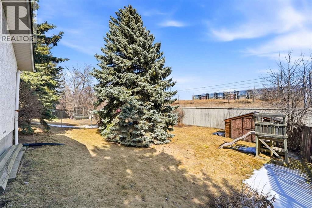 12028 Canfield Road SW, Calgary, Alberta  T2W 1V2 - Photo 32 - A2300272