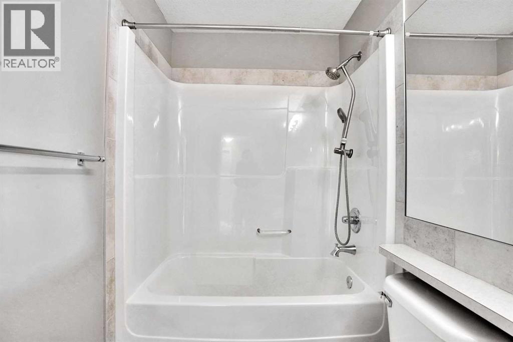 14 West Coach Way Sw, Calgary, Alberta  T3H 0M5 - Photo 38 - A2298380