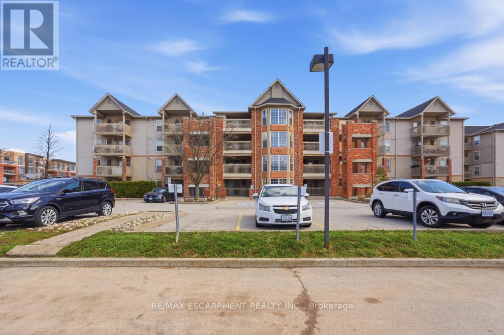 410 - 4013 Kilmer Drive, Burlington, Ontario  L7M 4M3 - Photo 1 - W12992632