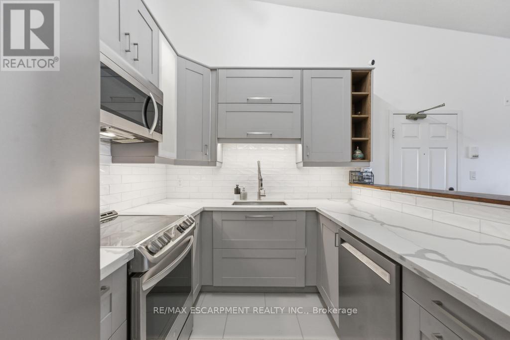 410 - 4013 Kilmer Drive, Burlington, Ontario  L7M 4M3 - Photo 6 - W12992632