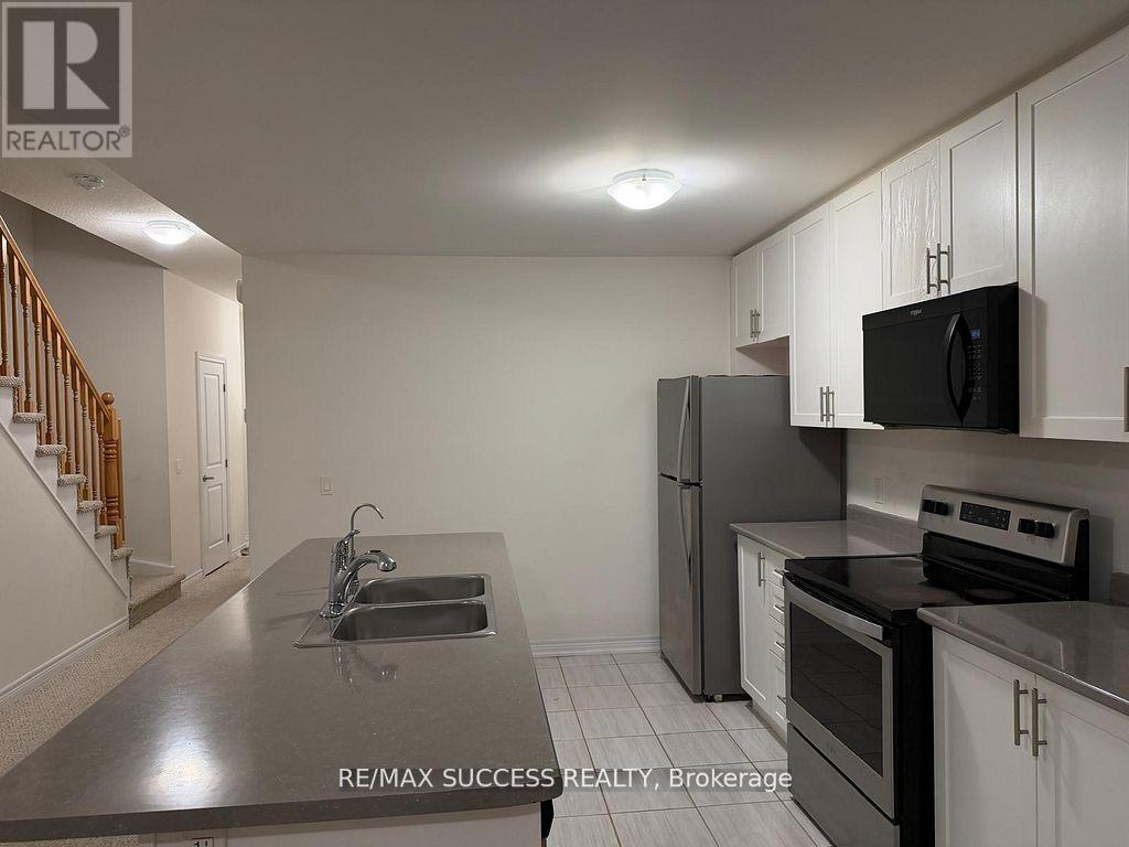 4 - 77 Diana Avenue, Brantford, Ontario N3T 0R6 - Photo 2 - X12992766