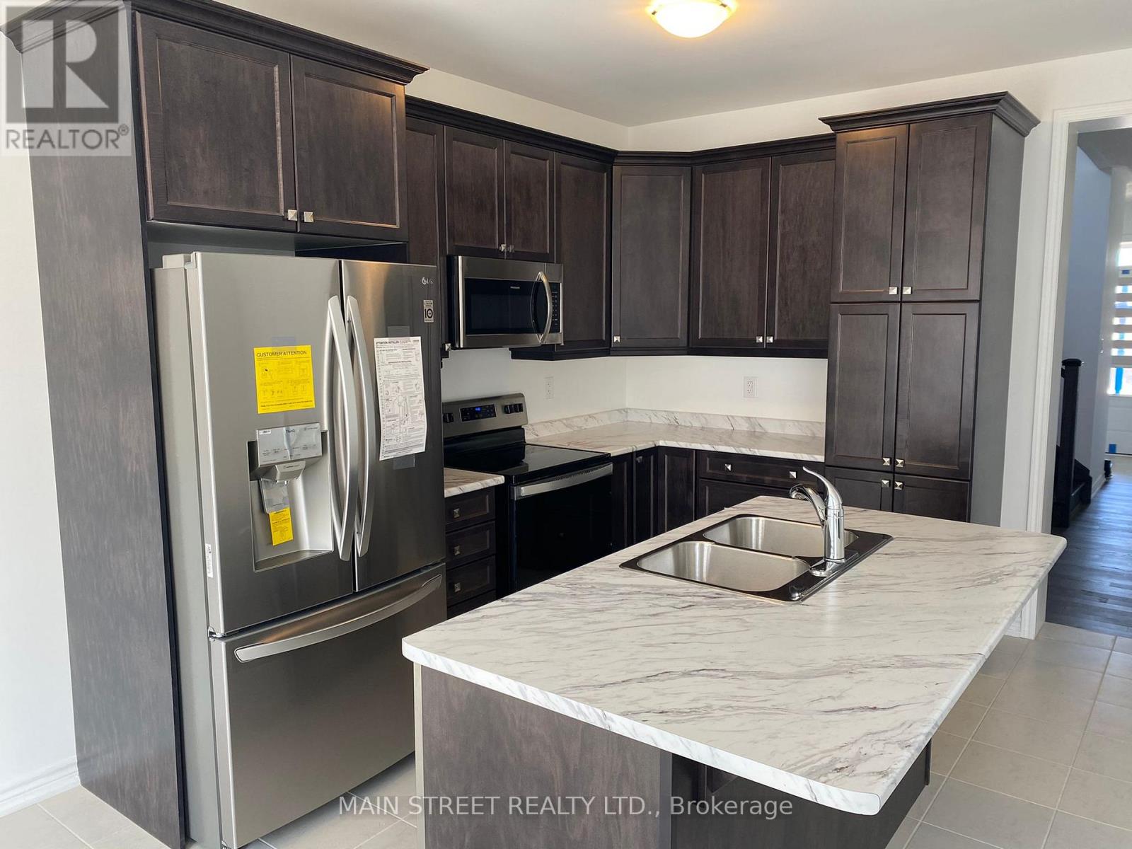 867 Whitlock Avenue, Milton, Ontario L9E 1R8 - Photo 5 - W12993022