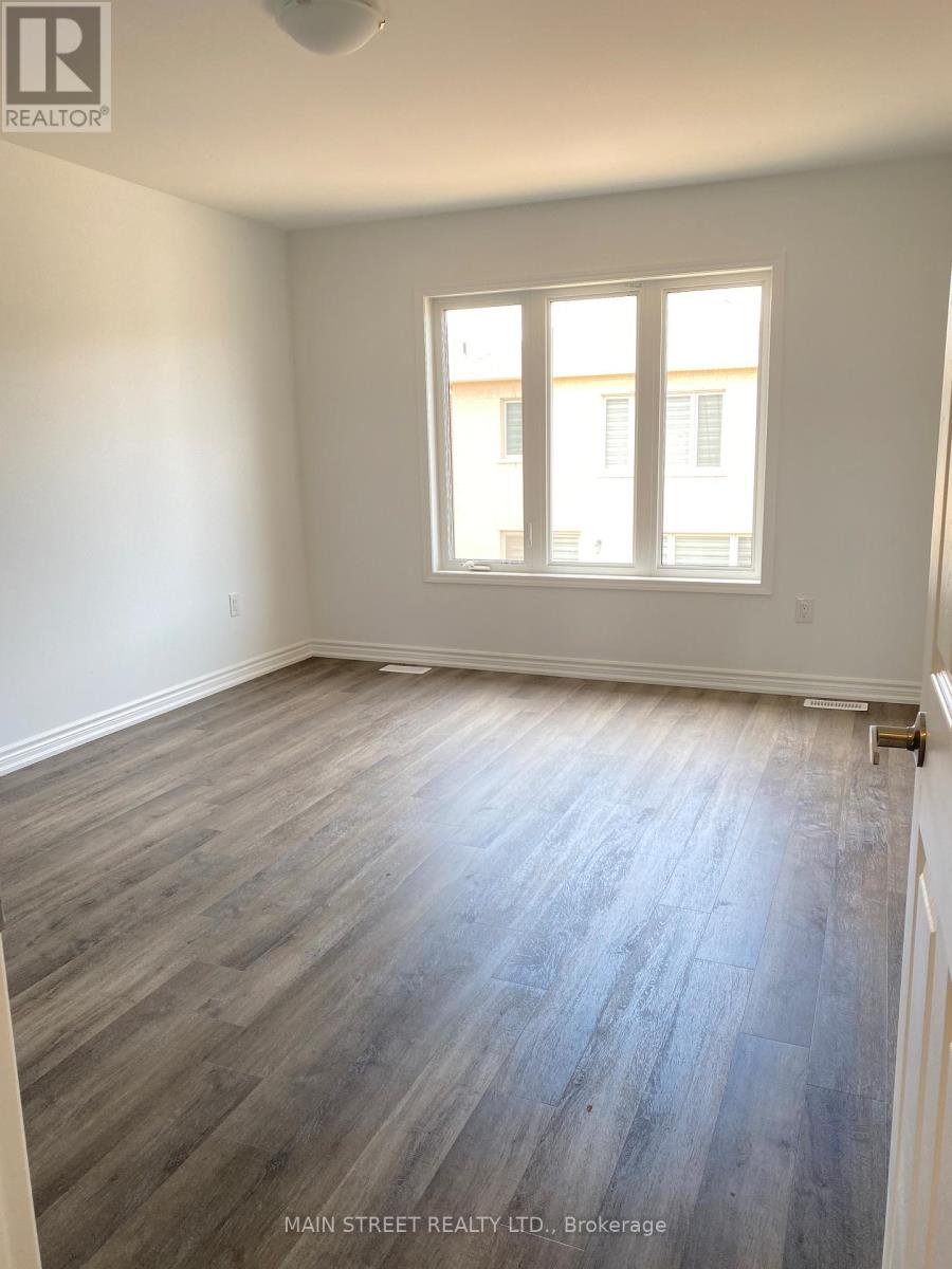 867 Whitlock Avenue, Milton, Ontario L9E 1R8 - Photo 9 - W12993022