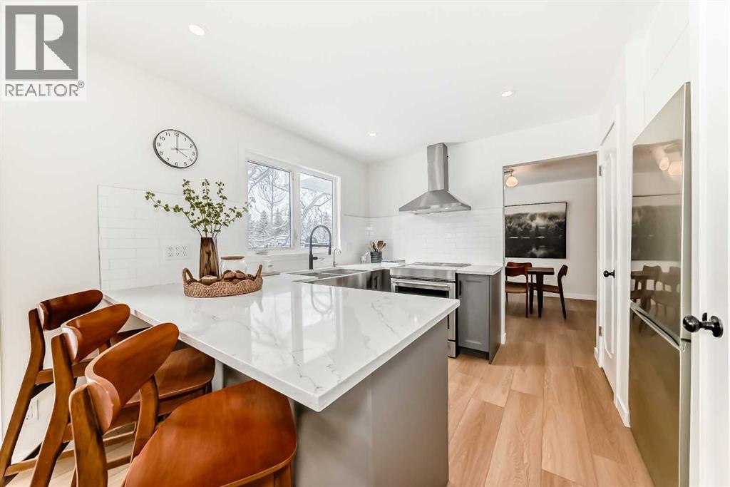 9611 Palisan Place SW, Calgary, Alberta  T2V 3T1 - Photo 7 - A2291998