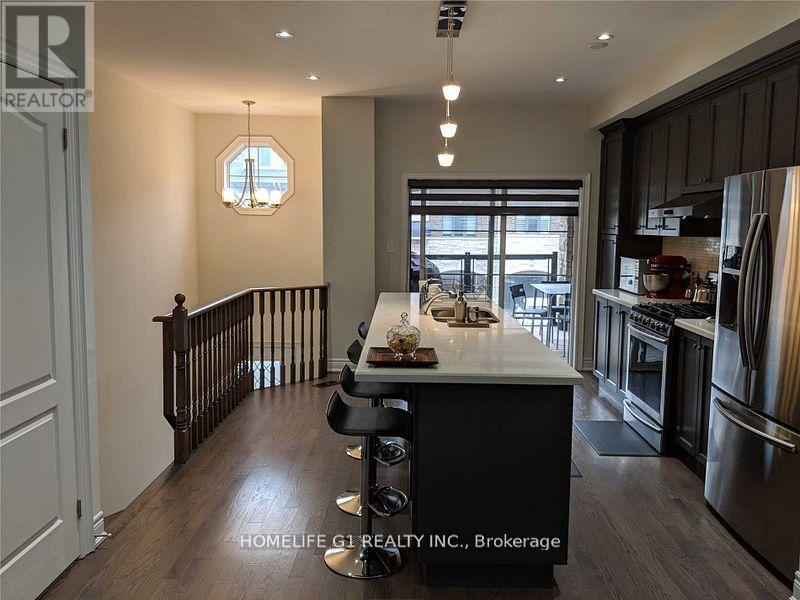 67 Dryden Way, Toronto, Ontario  M9R 0B2 - Photo 5 - W12993442