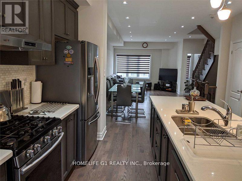 67 Dryden Way, Toronto, Ontario  M9R 0B2 - Photo 6 - W12993442