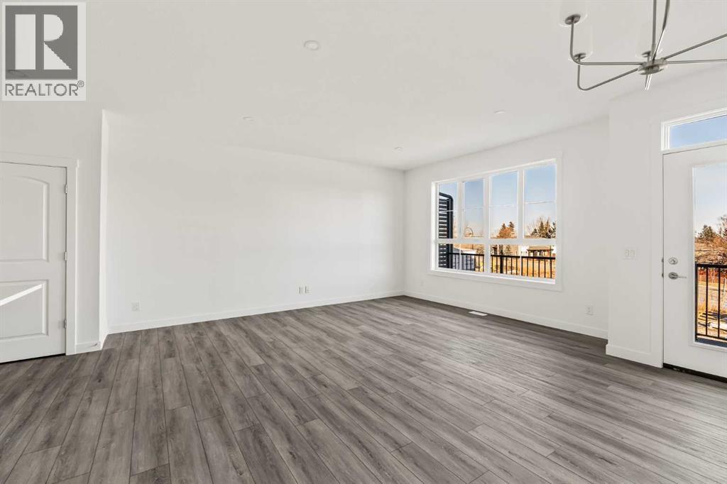 707 Sovereign Common SW, Calgary, Alberta  T3C 3Y3 - Photo 8 - A2279504