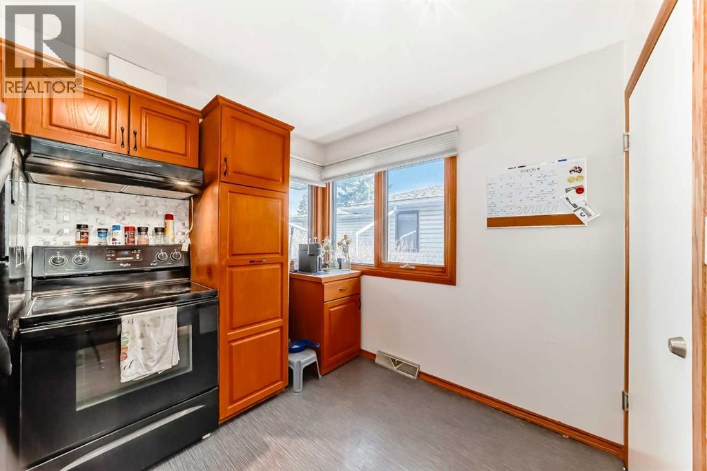 1415 Rosehill Drive Nw, Calgary, Alberta  T2K 1M3 - Photo 8 - A2295667