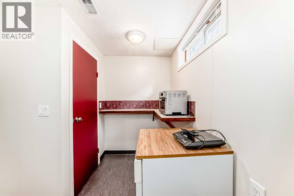 1415 Rosehill Drive Nw, Calgary, Alberta  T2K 1M3 - Photo 31 - A2295667