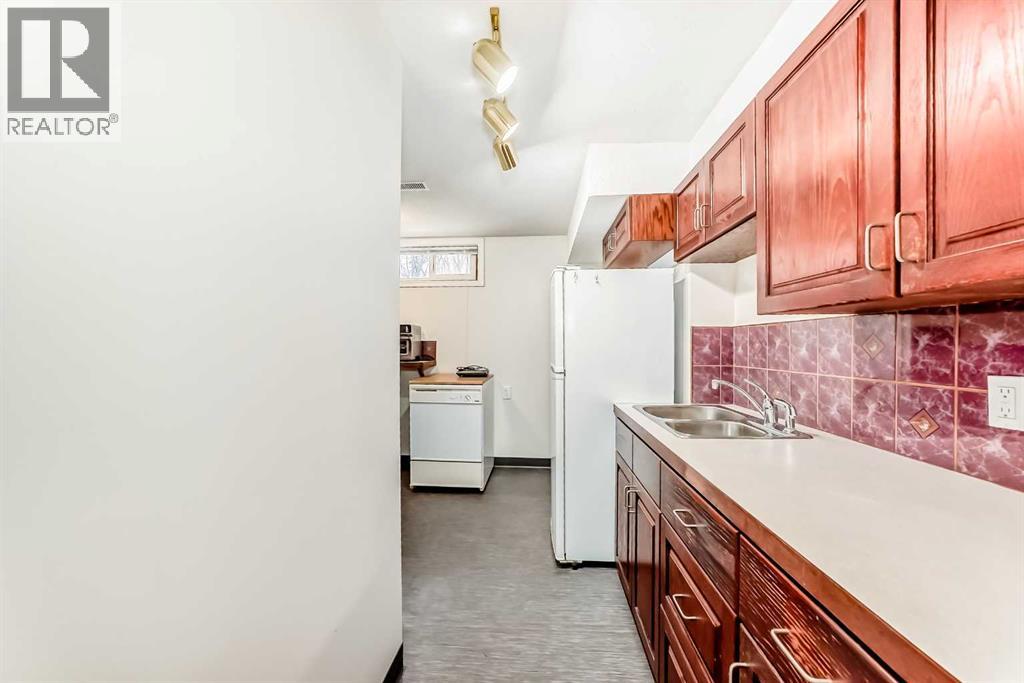 1415 Rosehill Drive Nw, Calgary, Alberta  T2K 1M3 - Photo 28 - A2295667