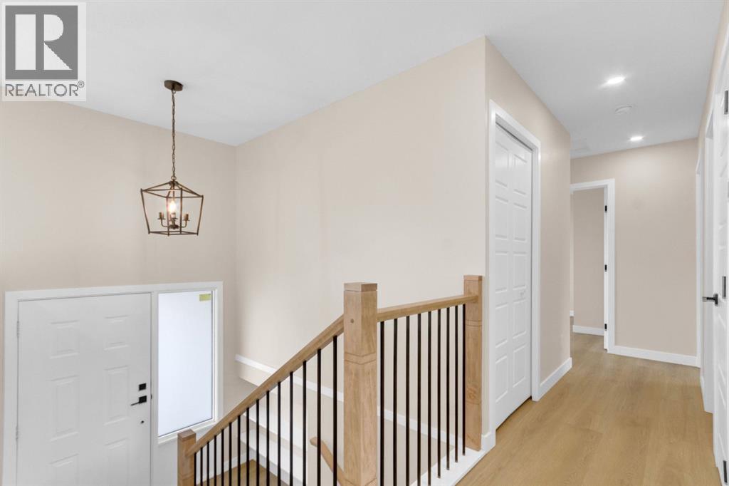 956 Bracewood Rise SW, Calgary, Alberta  T2W 3C9 - Photo 25 - A2299539