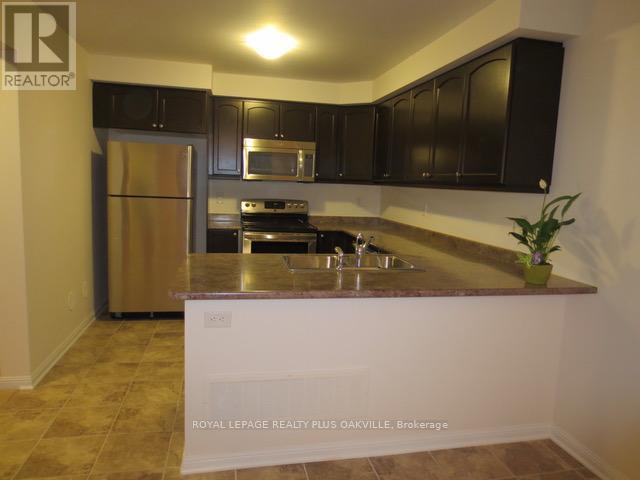 246 Mortimer Crescent, Milton, Ontario  L9T 8N7 - Photo 5 - W12993614