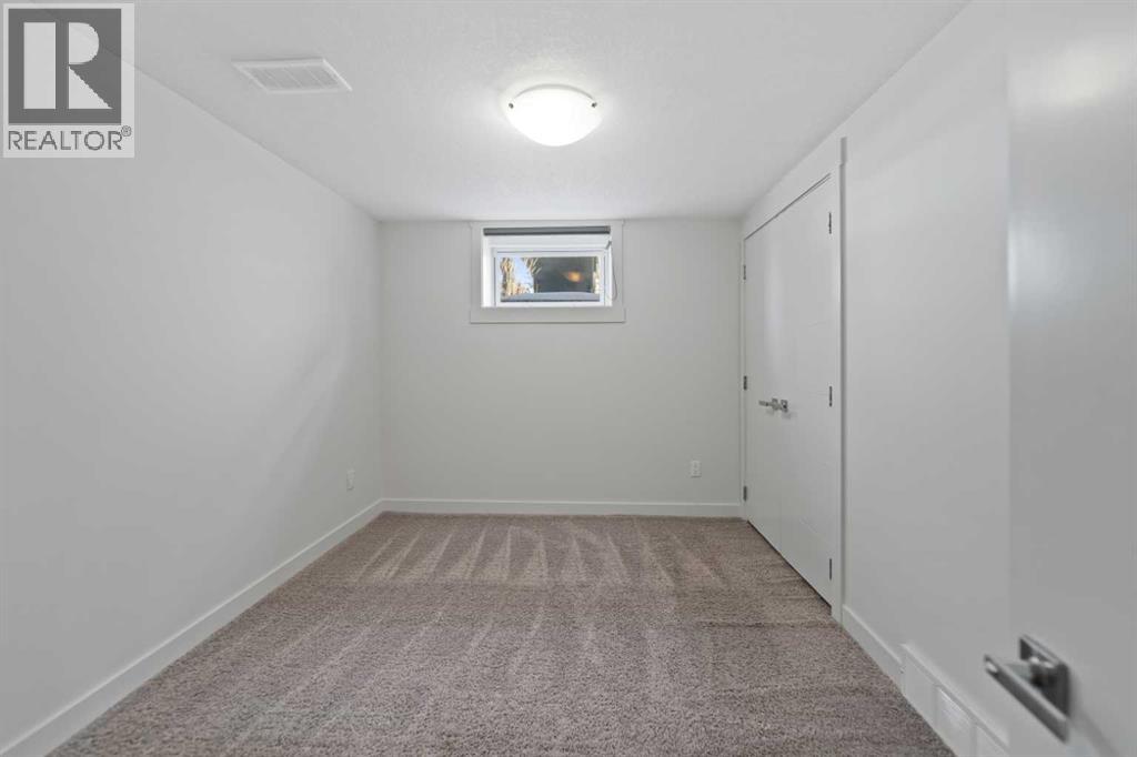 38 Westwood Drive SW, Calgary, Alberta  T3C 2V7 - Photo 30 - A2299811