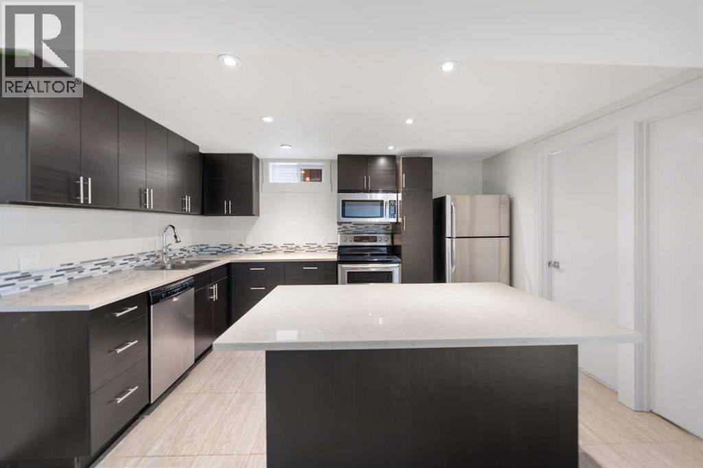 38 Westwood Drive SW, Calgary, Alberta  T3C 2V7 - Photo 24 - A2299811