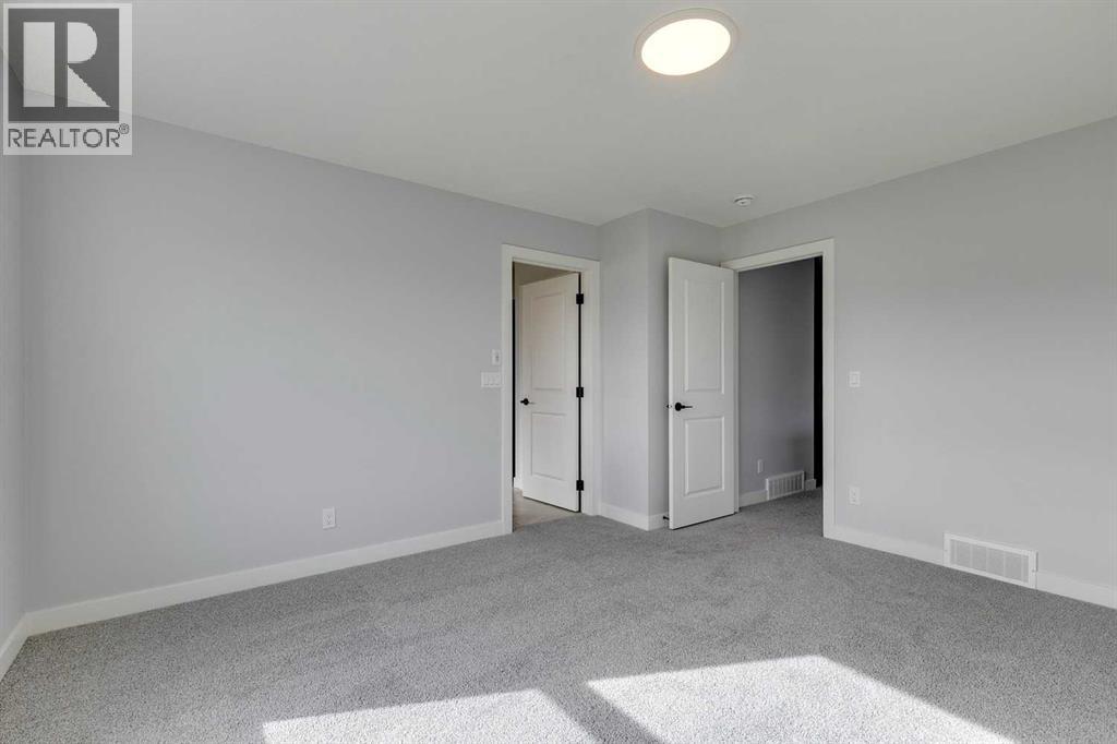 31 Creekstone Green SW, Calgary, Alberta  T2X 6H6 - Photo 35 - A2284189