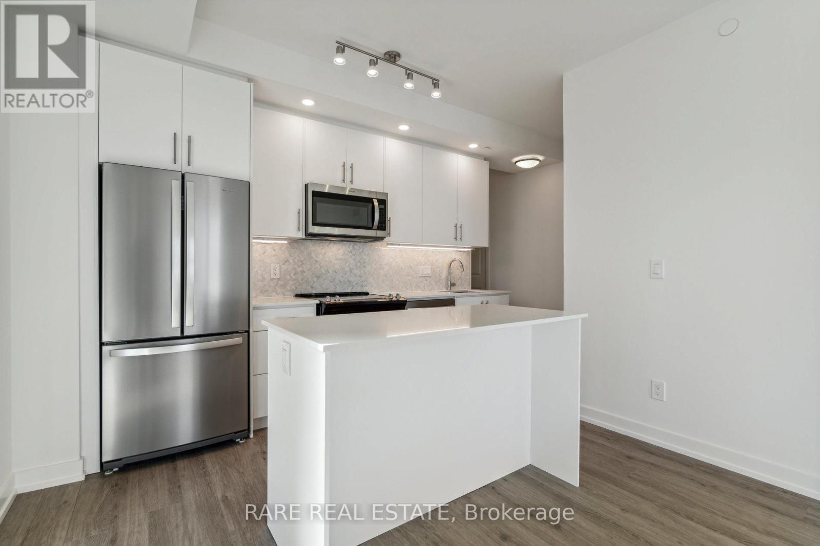 803 - 345 Wheat Boom Drive, Oakville, Ontario  L6H 7X5 - Photo 3 - W12993830