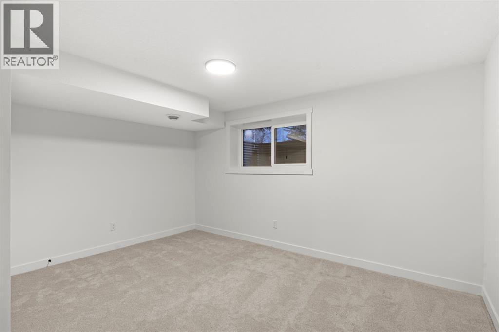 27 Glacier Drive Sw, Calgary, Alberta  T3E 5A2 - Photo 30 - A2276893