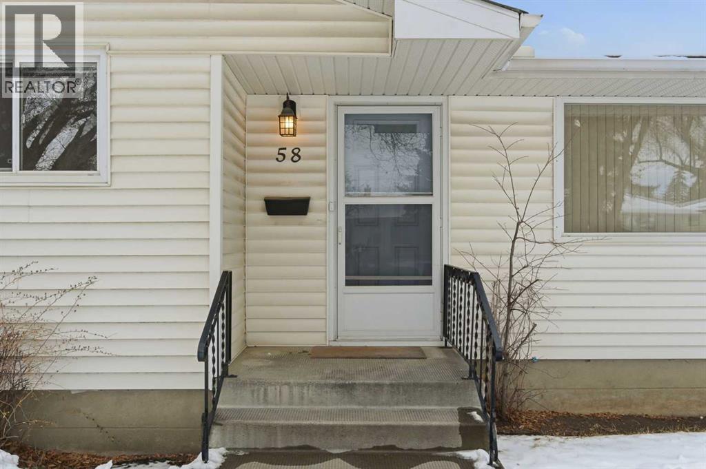 58 Westwood Drive SW, Calgary, Alberta  T3C 2V7 - Photo 3 - A2294238