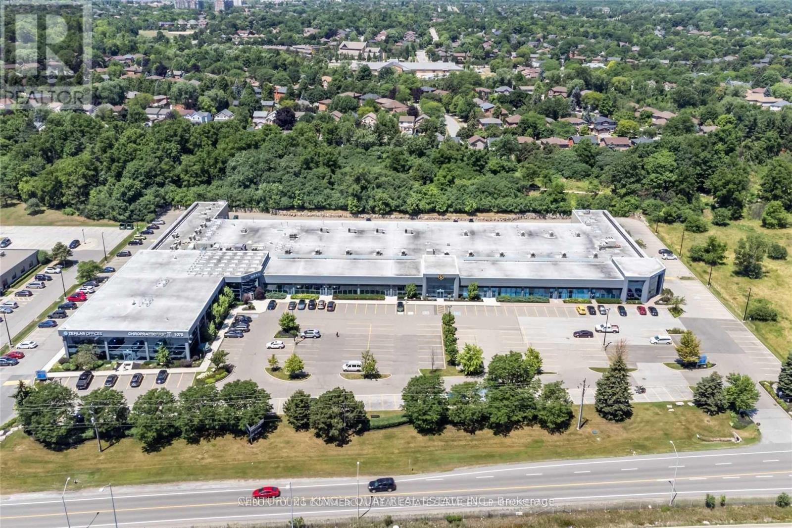 201 - 1075 North Service Road W, Oakville, Ontario  L6M 2G2 - Photo 2 - W12994026