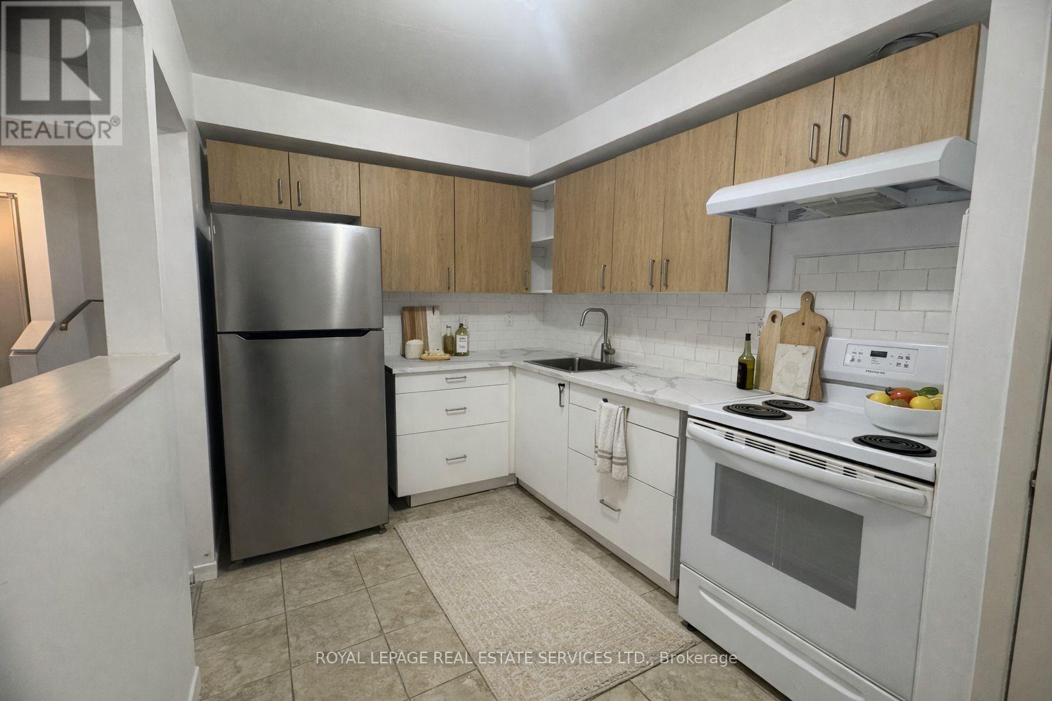 150 - 254 John Garland Boulevard, Toronto, Ontario  M9V 1N8 - Photo 11 - W12994094