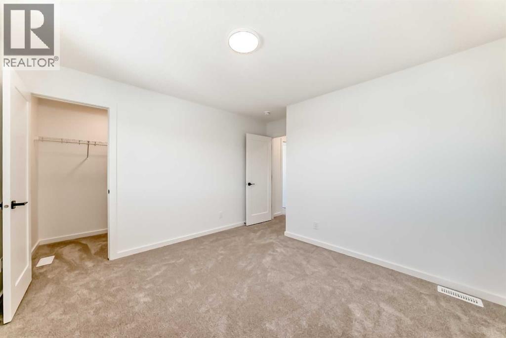 67 Creekside Path Sw, Calgary, Alberta  T2X 5V9 - Photo 21 - A2294127