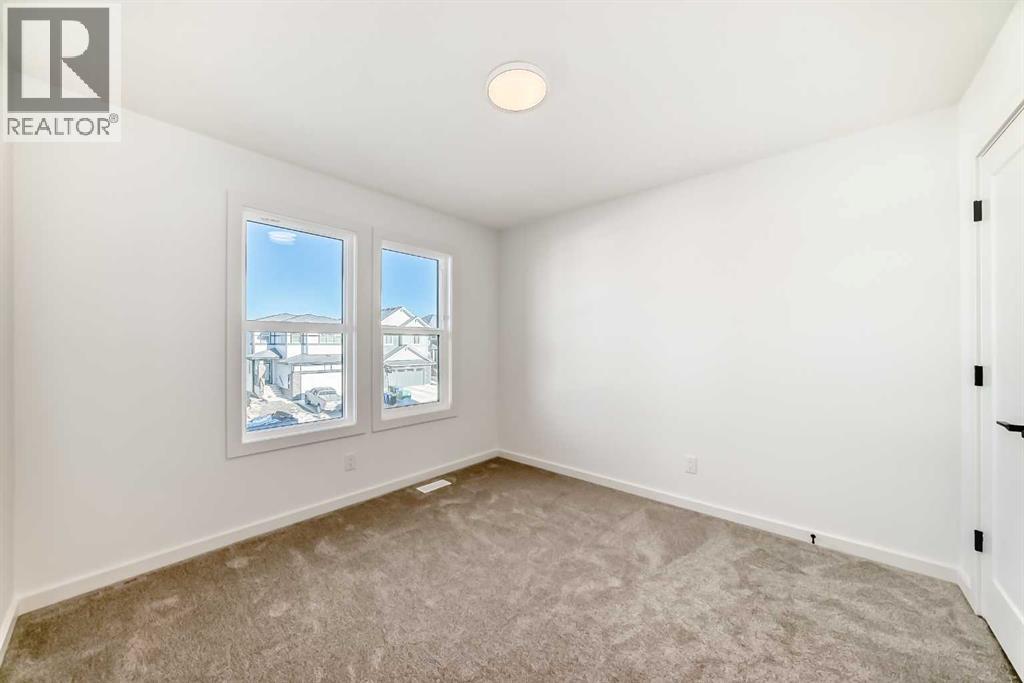 67 Creekside Path Sw, Calgary, Alberta  T2X 5V9 - Photo 26 - A2294127