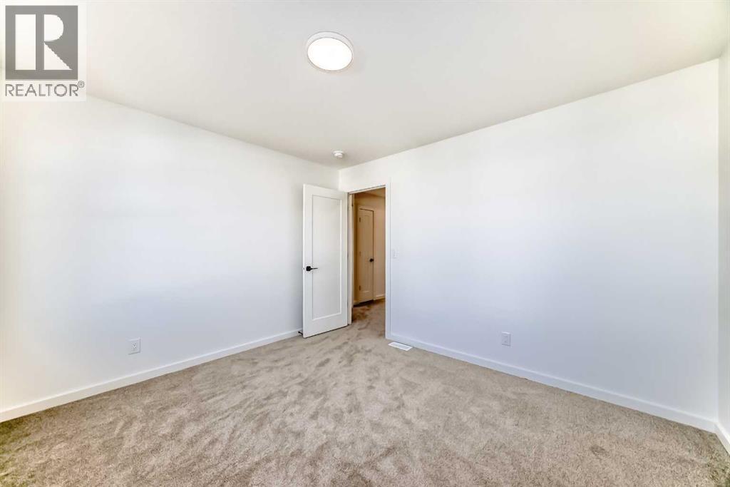 67 Creekside Path Sw, Calgary, Alberta  T2X 5V9 - Photo 24 - A2294127