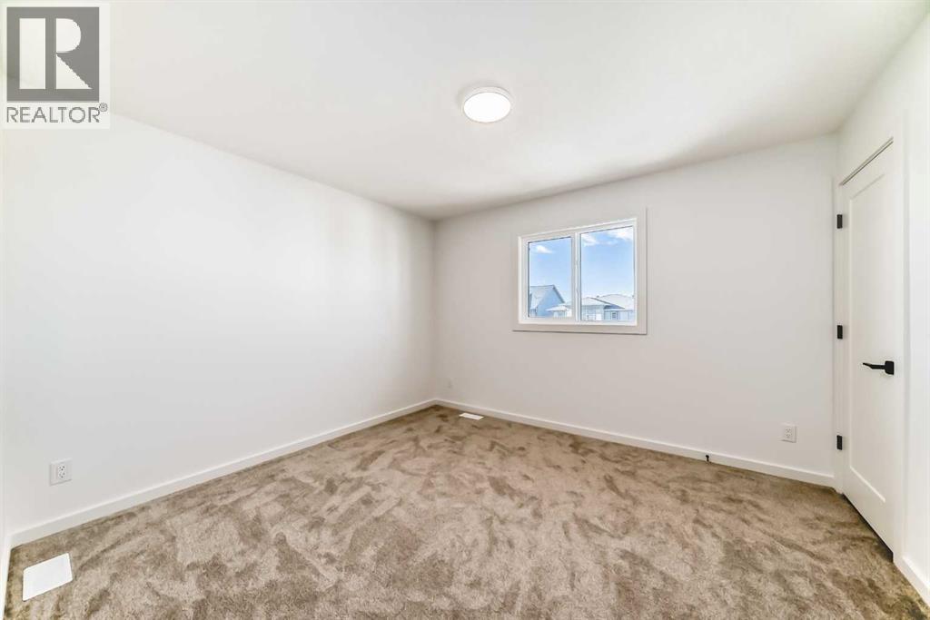 67 Creekside Path Sw, Calgary, Alberta  T2X 5V9 - Photo 20 - A2294127