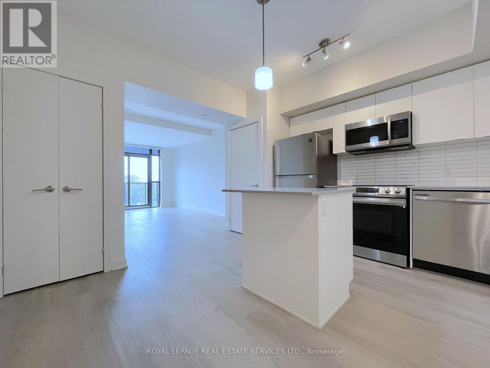 606 - 3385 Dundas Street W, Toronto, Ontario  M6S 2S2 - Photo 2 - W12994408