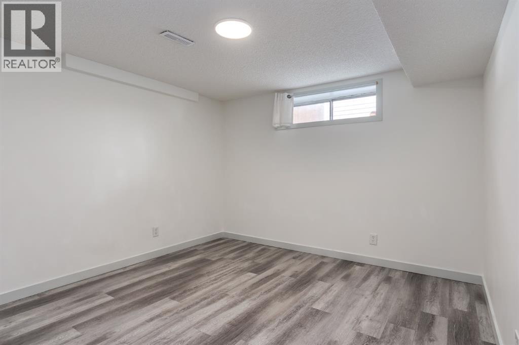 303 Coventry Close Ne, Calgary, Alberta  T3K 4C5 - Photo 24 - A2299541