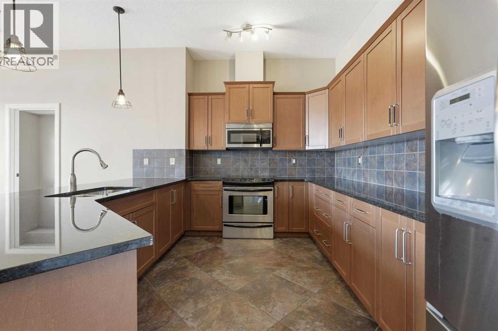 428, 35 Aspenmont Heights Sw, Calgary, Alberta  T3H 0E5 - Photo 5 - A2300420