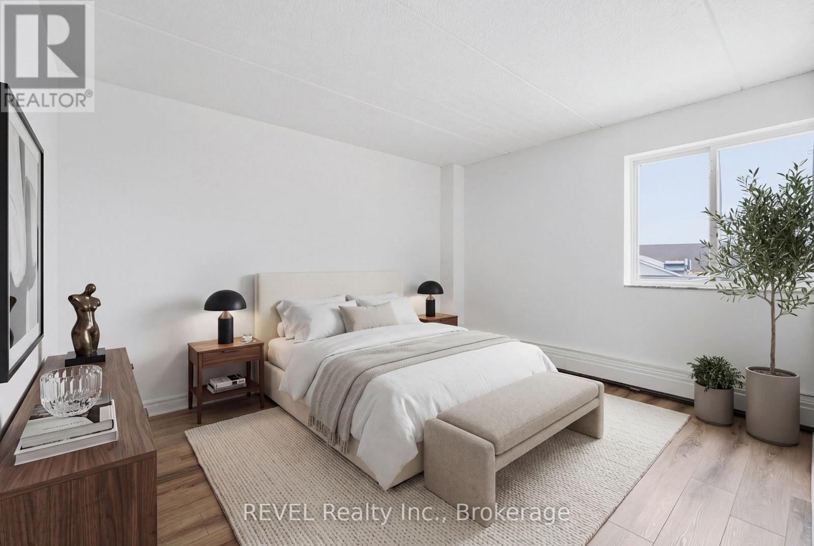 304 - 198 Scott Street, St. Catharines, Ontario L2N 5T3 - Photo 15 - X12995836