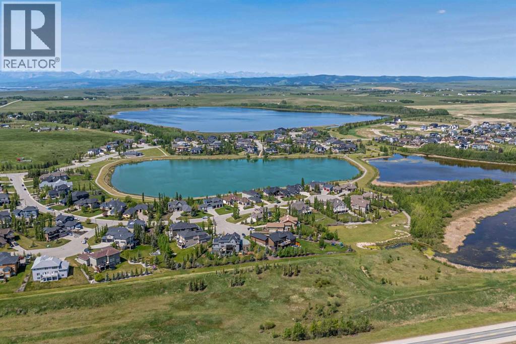 15 Montenaro Bay, Cochrane Lake, Alberta  T4C 0A5 - Photo 49 - A2298692