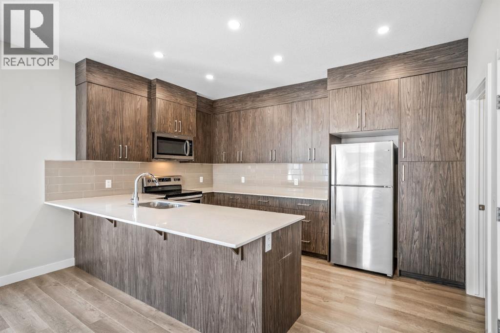 1005 Sage Meadows Gardens Nw, Calgary, Alberta  T3P 1K3 - Photo 6 - A2299897