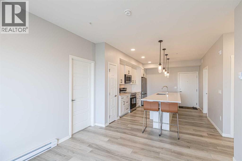 203, 360 Harvest Hills Way NE, Calgary, Alberta  T3K 2S1 - Photo 7 - A2300534