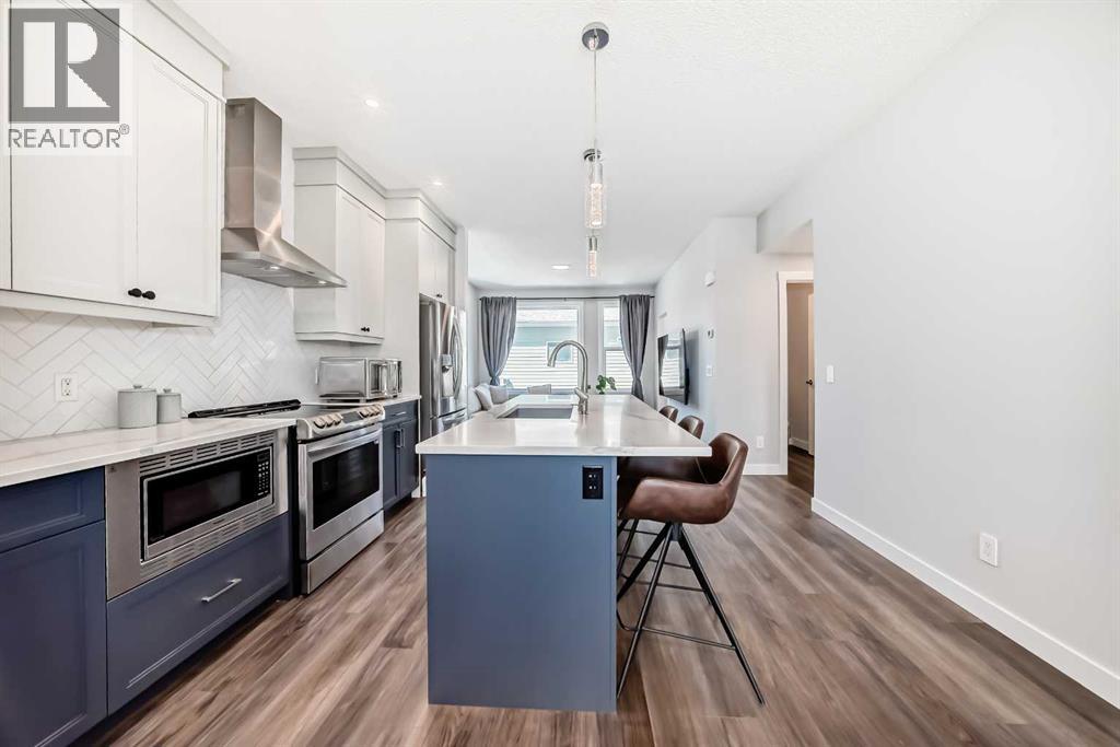 172 Rowmont Boulevard NW, Calgary, Alberta  T3L 0H3 - Photo 4 - A2301537