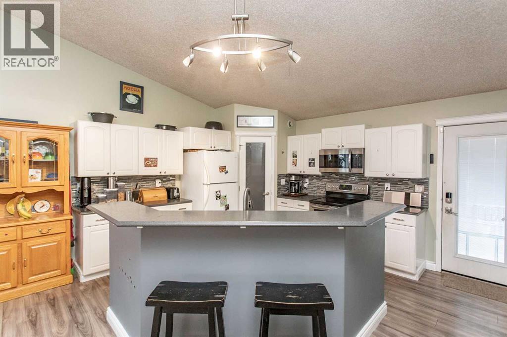 34 Iron Wolf Ridge, Lacombe, Alberta  T4L 2K2 - Photo 6 - A2289911