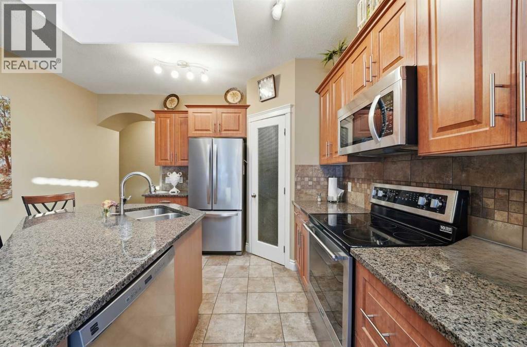 144 Reunion Close Nw, Airdrie, Alberta T4B 0M3 - Photo 8 - A2286456