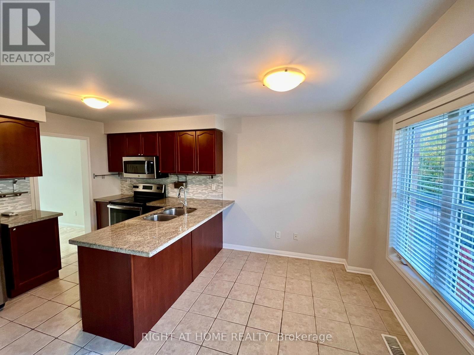 2385 Coho Way, Oakville, Ontario  L6M 0G6 - Photo 4 - W12997028