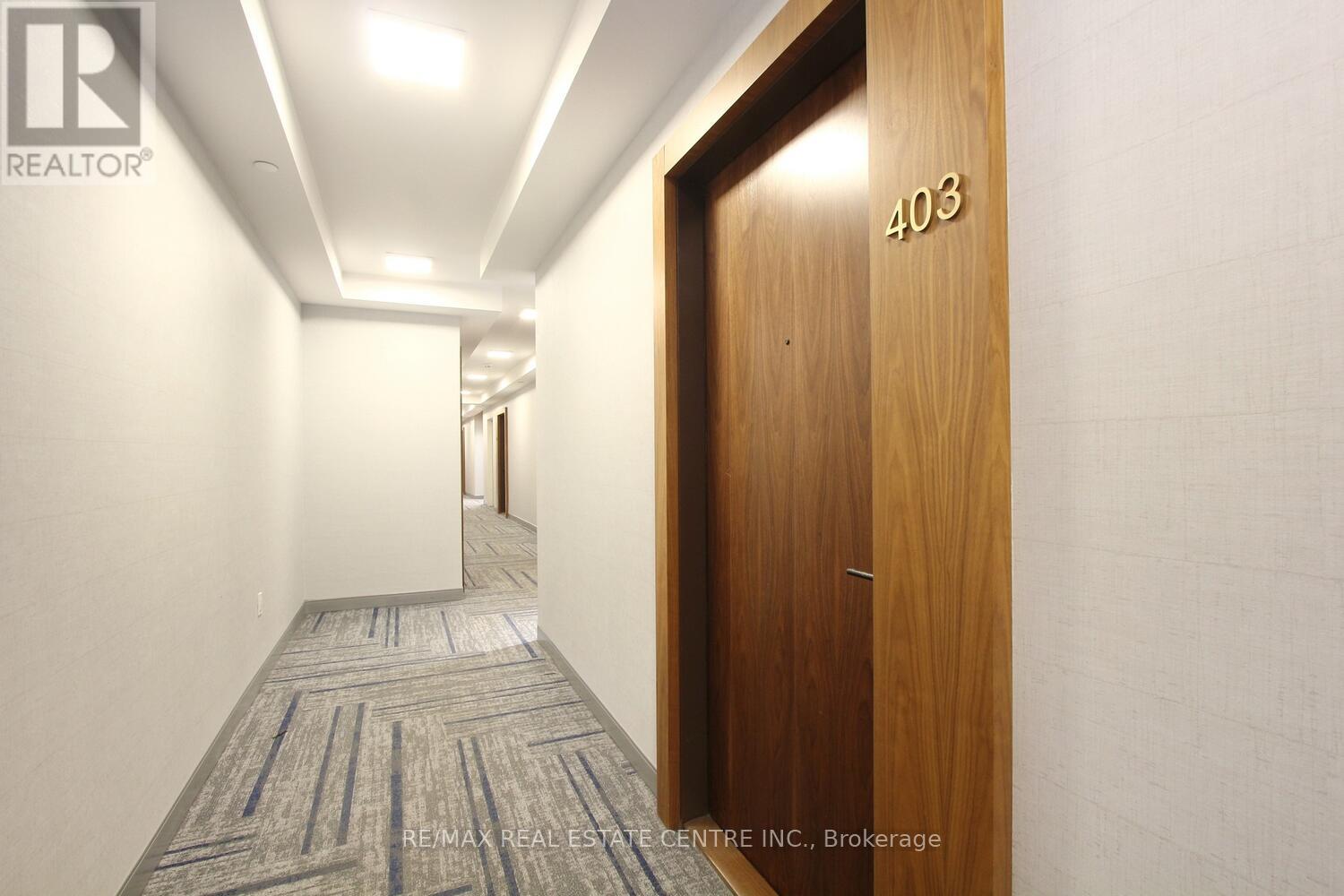 403 - 509 Dundas Street W, Oakville, Ontario  L5M 5P4 - Photo 3 - W12997218