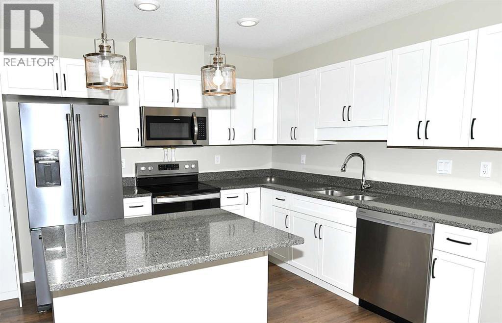 306, 499 Meadow Lake Court, Brooks, Alberta  T1R 0Y7 - Photo 2 - A2291542