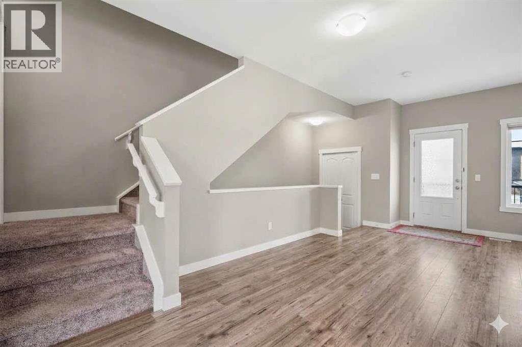 1006, 32 Horseshoe Crescent, Cochrane, Alberta  T4C 2P4 - Photo 2 - A2287330